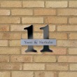 Gravoglas huisnummer met kunststof naambord